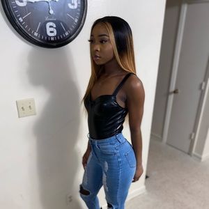 Black leather corset bodysuit